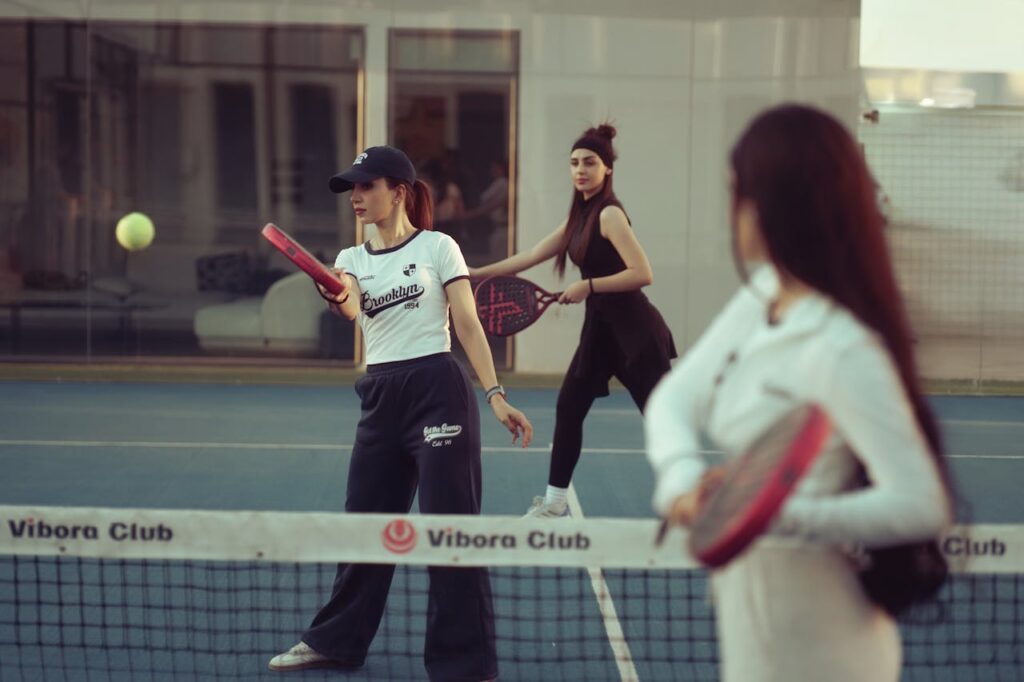 Group of women enjoying a pádel match at Vibora Club in Baghdad, Iraq.